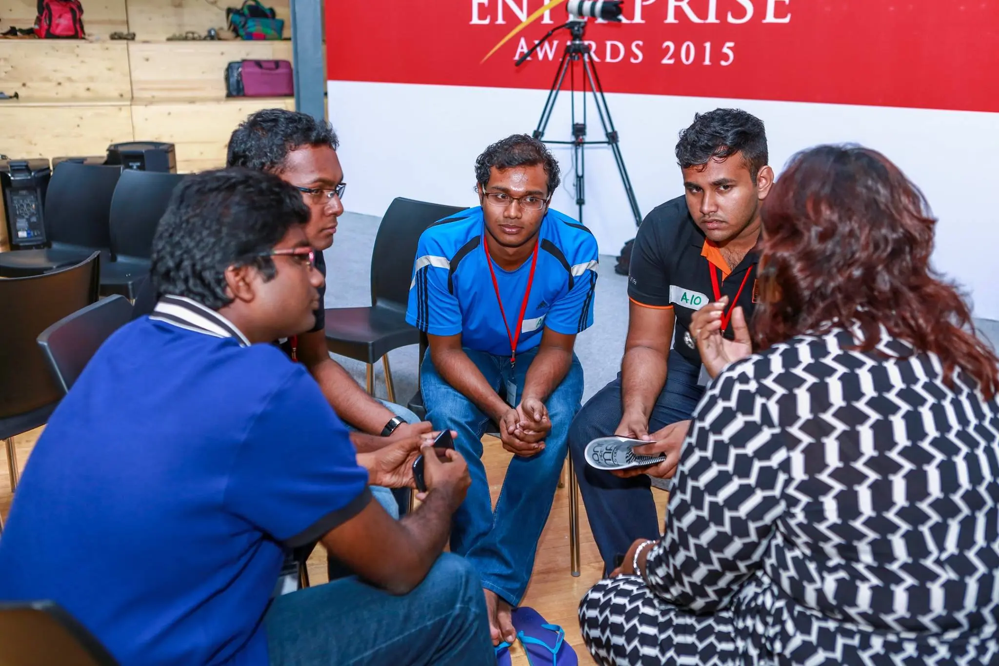 Team members discussing their project at the hackathon.